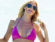 Victoria Silvstedt cleavage in pink bikini