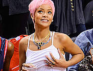 Rihanna without bra under tight white top