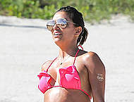 Eva Longoria in pink bikini on the beach