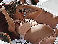 Pregnant Audrina Patridge in bikini at a pool
