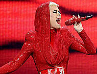Katy Perry sexy in red performing on a stage