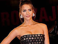 Jessica Alba shows legs at Machete premiere