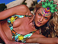 Candice Swanepoel posing in sexy bikinies