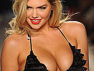 Kate Upton shows cleavage at Beach Bunny show