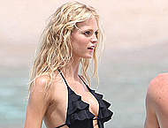 Erin Heatherton sexy posing in black swimsuit