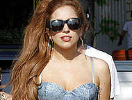 Lady Gaga in bikini top and short shorts