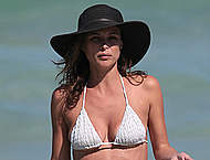 Josie Maran cleavage in bikini on a beach Josie Maran cleavage in bikini on a beach