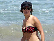 Ashley Tisdale in bikini on a beach in Malibu Ashley Tisdale in bikini on a beach in Malibu