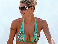 Michelle Hunziker caught in bikini on a beach Michelle Hunziker caught in bikini on a beach